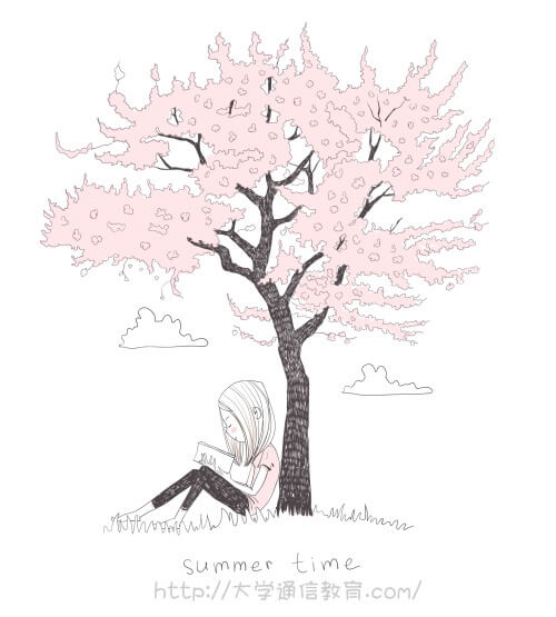 職場の休憩時間に桜の木の下で読書